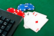 Fragment of black keyboard with gamble chips and cards. Fragment of black keyboard with gamble chips and cards.