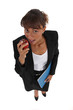 Businesswoman eating an apple Businesswoman eating an apple