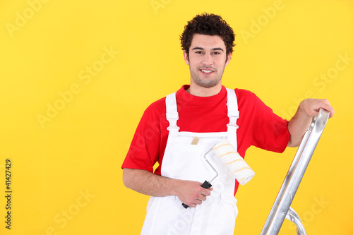 Photo: Portrait of a professional house painter Portrait of a professional house painter