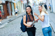 two woman tourists in the city