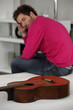 young with guitar