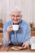 grandmother having coffee