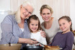family making crepes surrounded family making crepes surrounded
