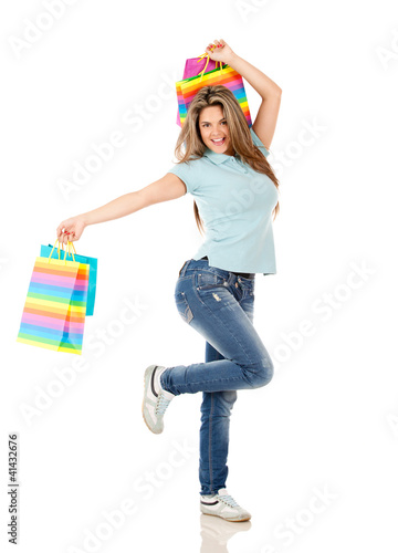 Photo: Shopping woman jumping Shopping woman jumping