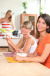 Girls in the kitchen eating breakfast