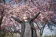 Beautiful young woman in spring garden