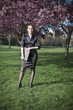 Business woman with laptop in park