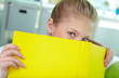 Peeking out of book