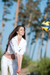 Woman playing volleyball on beach Woman playing volleyball on beach
