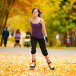 Woman on roller skates in the park Woman on roller skates in the park