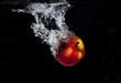 Apple dropped in water.