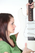 beautiful woman holding a guitar beautiful woman holding a guitar