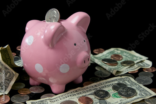 Photo: Pink Polka Dot Piggy Bank with Cash Pink Polka Dot Piggy Bank with Cash