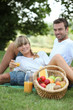 couple having picnic in the park