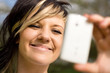 Woman uses a Mirror-App