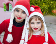 Christmas santa costumer kid girls portrait smiling