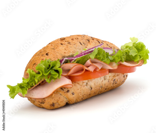 Photo: fast food baguette sandwich with lettuce, tomato, ham and chees fast food baguette sandwich with lettuce, tomato, ham and chees