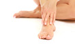 Female feet isolated on white