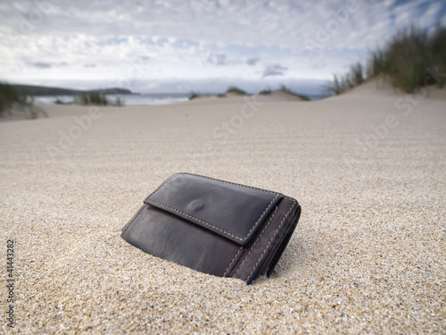 Photo: Billfold on the beach Billfold on the beach