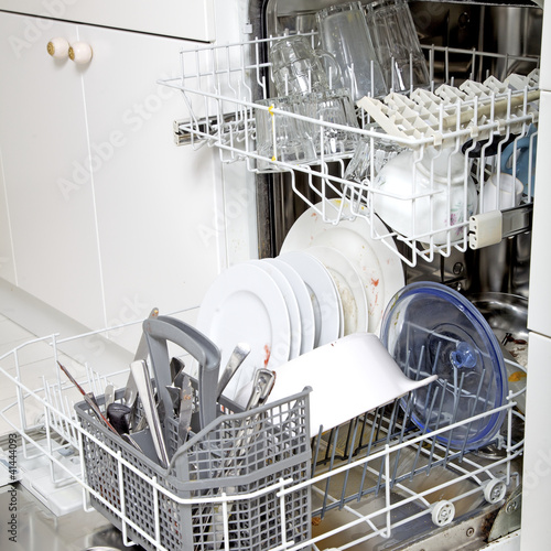 Photo: Dishwasher with dirty dishes Dishwasher with dirty dishes