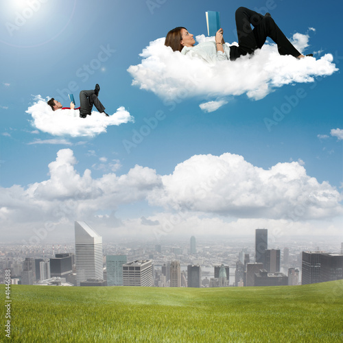 Photo: Business people reading book Business people reading book