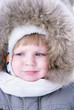 Cute boy in winter clothes