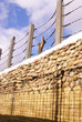 high fence and blue sky