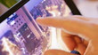 A fényképek részletei one photograph with a city on digital tablet-pc