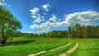 Vídeo: spring landscape with a rural road. HDR timelapse. spring landscape with a rural road. HDR timelapse.
