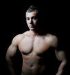 Bodybuilder showing his muscles Bodybuilder showing his muscles