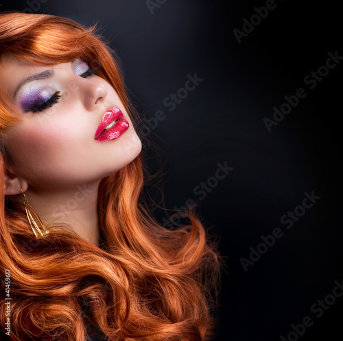 Photo: Wavy Red Hair. Fashion Girl Portrait Wavy Red Hair. Fashion Girl Portrait