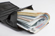many banknotes in wallet