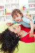 Mother playing with child