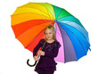 Kind mit einem bunten Regenschirm