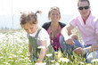 Foto: Little girl and her parents Little girl and her parents