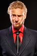 Photo: Portrait of young man with a doubting grimace Portrait of young man with a doubting grimace