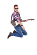 passionate guitarist jumps in the air passionate guitarist jumps in the air