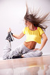 beautiful woman dancer resting on the floor