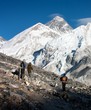 view of Everest and Nuptse from Kala Patthar with tourists