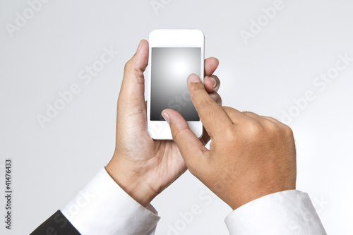 Photo: Young adult using smart phone Young adult using smart phone