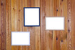 Pictures frames on pine wall Pictures frames on pine wall
