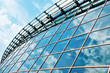 Skyscrapers with clouds reflection
