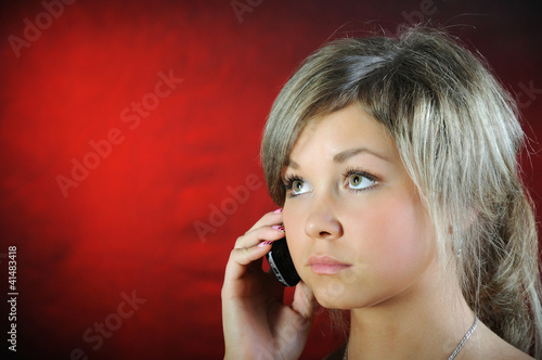 Photo: Girl, talking on phone. Girl, talking on phone.