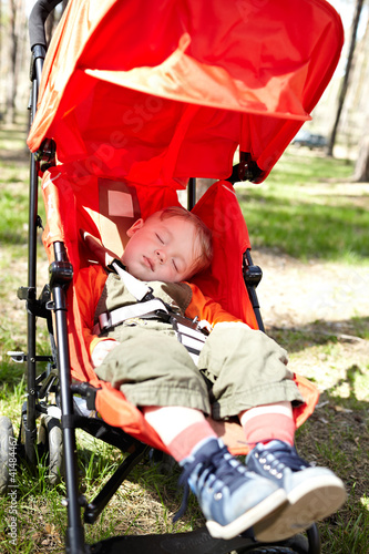 Photo: Kid sleeps the buggy Kid sleeps the buggy