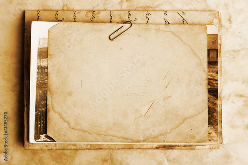 Photo: Vintage background with old paper, letters and photos Vintage background with old paper, letters and photos