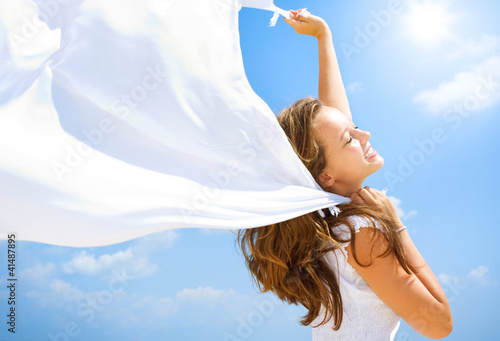 Photo: Beautiful Girl Having Fun on the Beach Beautiful Girl Having Fun on the Beach