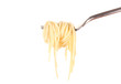 Delicious spaghetti on a fork close-up on white background