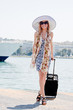 The girl on the background of the ocean liner