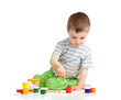 kid drawing with paints