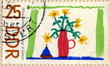 Foto: Canceled german stamp "Child's drawing - flowers" Canceled german stamp "Child's drawing - flowers"